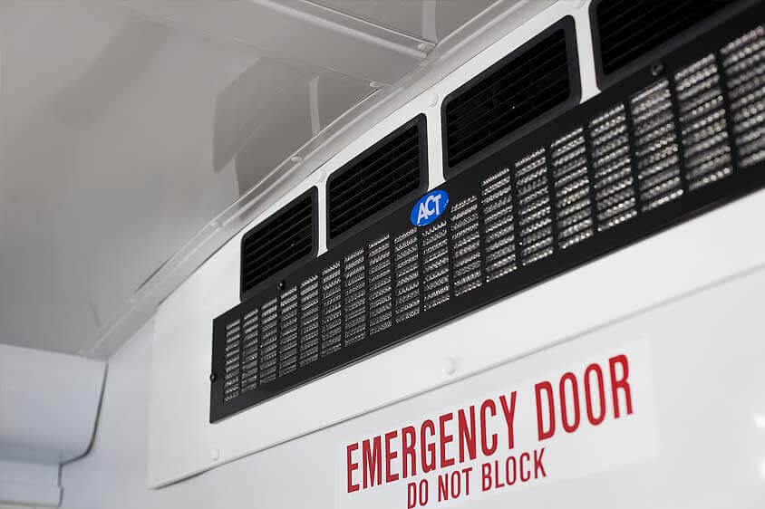 Rear-mounted air conditioning system inside a Collins Magellan school activity bus