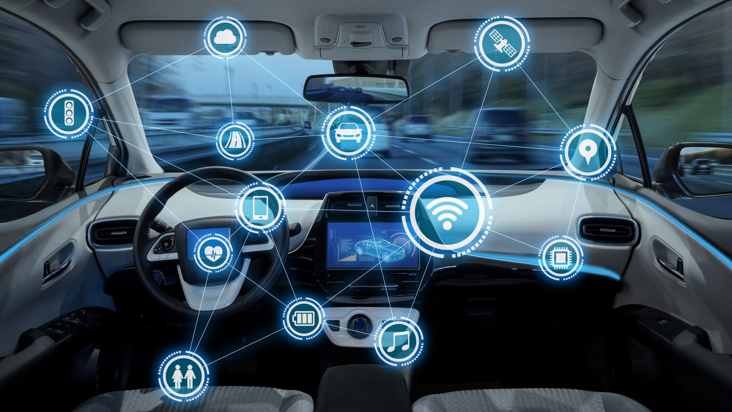 inside view of car with icon images for new technology